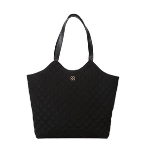 Black quilted tote bag with golden floral logo and leather handles on white background