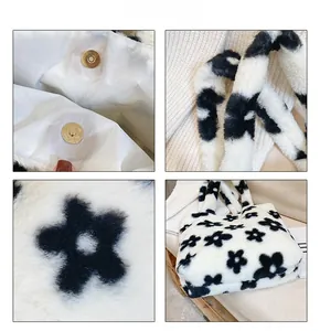 Vue détaillée du sac en peluche à fleurs avec boucle magnétique et texture douce en fourrure