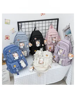 Multiple colors of ita bags with clear display windows and decorative plush charms