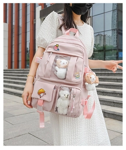 Pink Japanese Harajuku school backpack with transparent display window and cute plushies