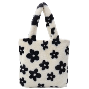 Faux fur plush tote bag with black and white floral pattern for winter fashion