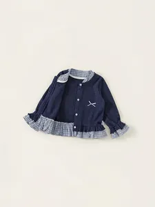 Navy blue knitted girls cardigan with plaid ruffle trim and white embroidery detail