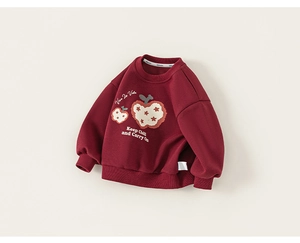 Detail van bordeauxrood meisjessweatshirt met appelprints en stijlvolle slogans