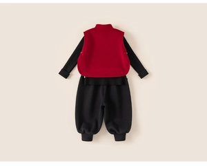 Detailed flat lay of children's red vest, black ribbed shirt and joggers outfit set