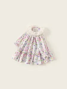 Girl's long-sleeve floral dress with lace collar and ruffled cuffs in cream cotton fabric
