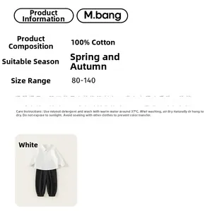 Detail view of boys cotton set showing white long-sleeve shirt and black cargo pants fabric