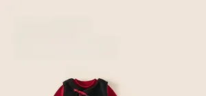 Close-up of traditional Chinese embroidery and red frog button on a kids vest