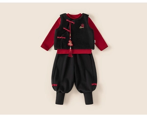 Close-up of traditional Chinese New Year kids set with red top and black fleece vest