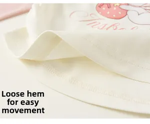 Detail of the loose hem on girls' strawberry cartoon top with neat stitching