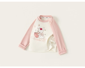 Close-up of girls' cotton long sleeve tee with pink raglan sleeves and rabbit print