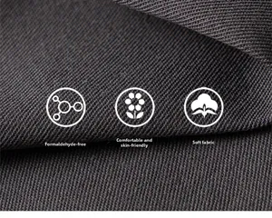 Macro shot of soft charcoal grey knitted fabric showing fine texture and skin-friendly quality