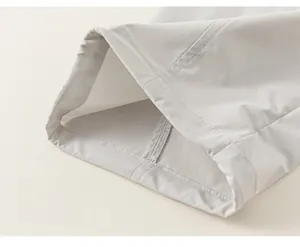 Detail of loose hem on kids cargo pants with reinforced double stitching for comfort