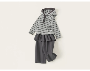 Detail of grey striped girls hoodie and trousers with a layered skirt waist detail