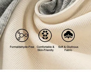 Close-up of soft ribbed knit fabric texture in cream and light gray for kids wear