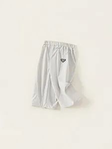 Minimalist light gray kids cargo pants with elastic waist and stylish sport woven label
