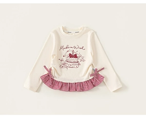 Detail of child long-sleeve tee with red gingham ruffled hem and bow accents