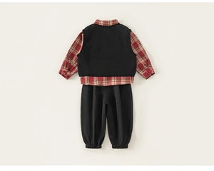 Detailed flat lay of boys' plaid shirt with black knitted vest and matching jogger pants