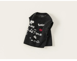 Detail of a black knitted sleeveless vest with ChillTime cartoon prints and embroidery