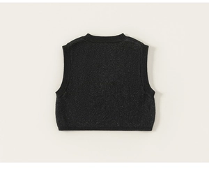 Detail view of dark grey knitted vest with ribbed edges and soft wool texture for boys