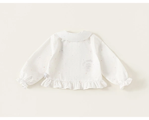 Vue détaillée du chemisier blanc en coton pour filles avec pois colorés et col Claudine