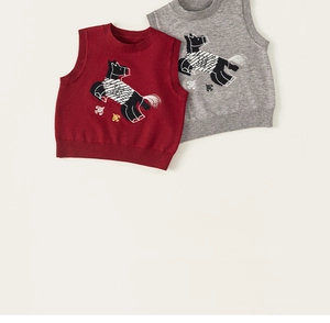 Detailed view of knitted cotton vests with cartoon horse embroidery and ribbed hem