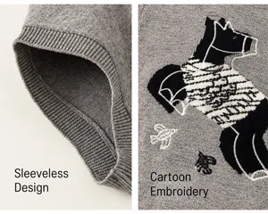 Detailed close-up of grey knit vest showing sleeveless rib design and cartoon embroidery