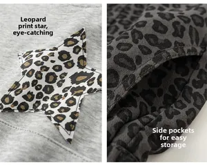 Details des grauen Kapuzenpullovers mit Leoparden-Sternen-Patch und Seitentaschen