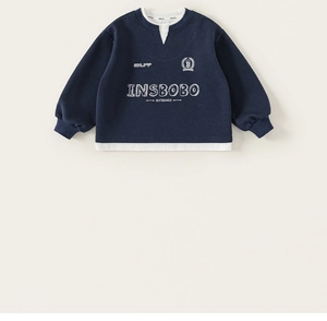Detailed view of the layered collar and letter print on this navy blue sweatshirt