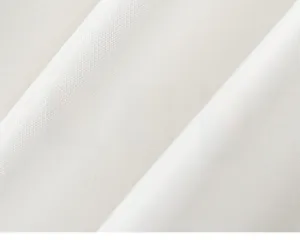 Detailed macro view of high-density white cotton fabric with a soft twill weave structure