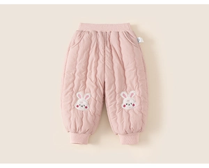 Detail of pink quilted toddler pants with elastic waist and cute rabbit embroidery
