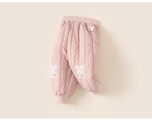 Close-up of quilted pink baby trousers with rabbit embroidery and elastic ribbed cuffs