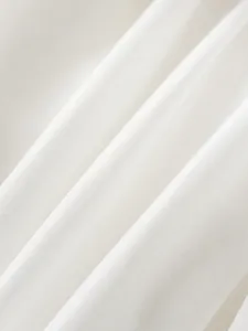 White irregular tulle skirt for girls with high-quality soft pleated fabric and mesh details