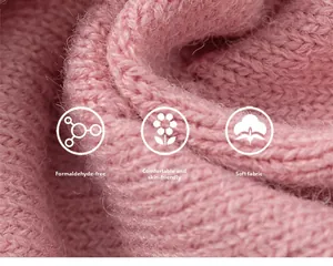 Nahaufnahme von weichem rosa Strickstoff mit atmungsaktiver Textur und Hautfreundlichkeit