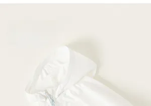 Close-up of kids breathable white sun protection hoodie with blue zipper detail