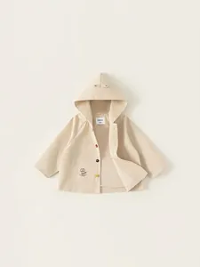 Fashionable cream toddler hooded jacket with colorful buttons and cute puppy graphic print
