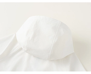 Detailed close-up of a white hooded jacket featuring high-density fabric and precise stitching