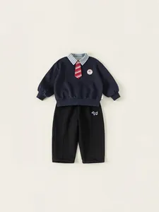 Ensemble deux pièces pour garçon style académie avec sweat bleu marine et jogging