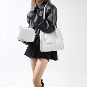 Detailed view of ivory white litchi textured PU leather tote bag set for women