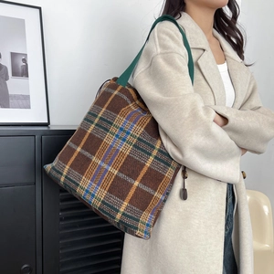 Classic plaid tweed tote bag in brown and yellow with dark green shoulder strap
