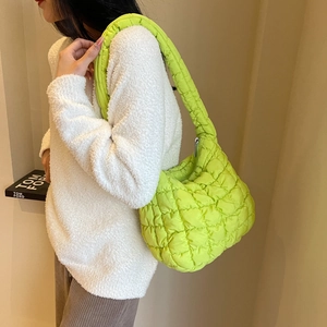 Fluorescent green quilted puffer shoulder bag with a unique textured fabric for women