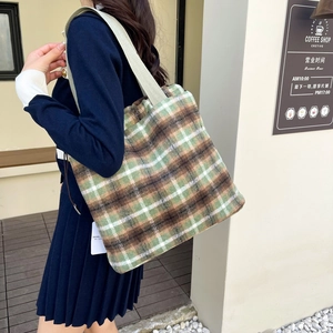 Classic checkered wool tote bag in green and brown with comfortable shoulder straps