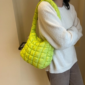 Fluorescent green quilted puffy shoulder bag with a padded texture for women's winter style