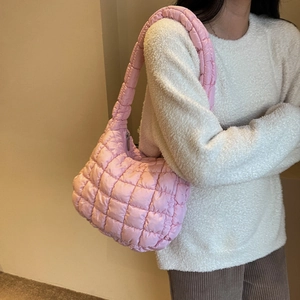 Minimalist pink quilted puffer shoulder bag for women with cloud design and soft texture