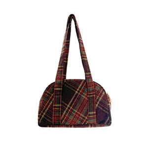 Retro red and green plaid wool shoulder bag with a curved design and gold zipper