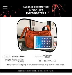 Detailed size parameters of orange nylon crossbody bag with iPad for scale comparison