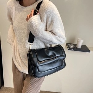 Quilted black PU leather crossbody bag with wide shoulder strap and elegant gold buckle