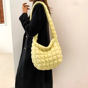 Minimalist cream quilted puffy shoulder bag for women with large diamond stitching