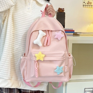 Sac à dos en nylon rose pour femmes avec charms en peluche étoile et os au style décontracté
