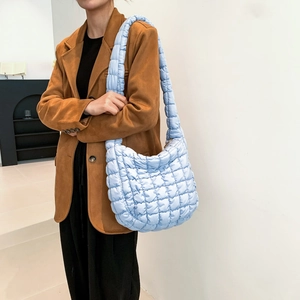 Minimalist light blue quilted cloud shoulder bag for women with padded pattern