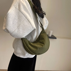 Army green nylon crescent crossbody bag with minimalist pleated texture for women
